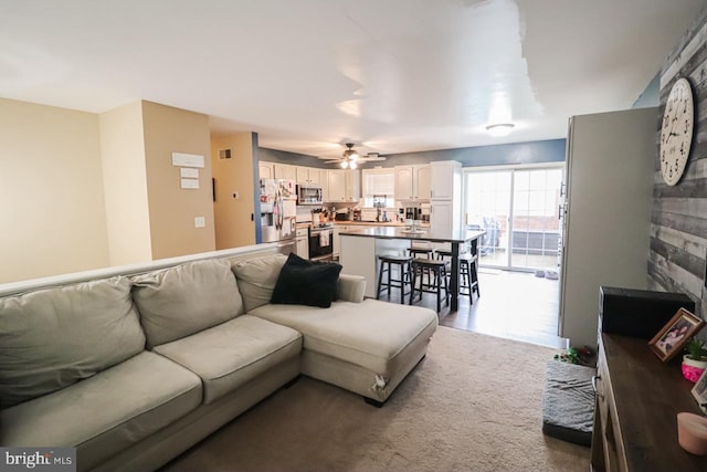 230 Jewel Dr, York, PA 17404 - living room featuring ceiling fan