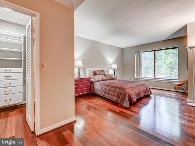 1 Gristmill Ct Unit 103, Pikesville, MD 21208 - bedroom featuring wood finished floors and baseboards