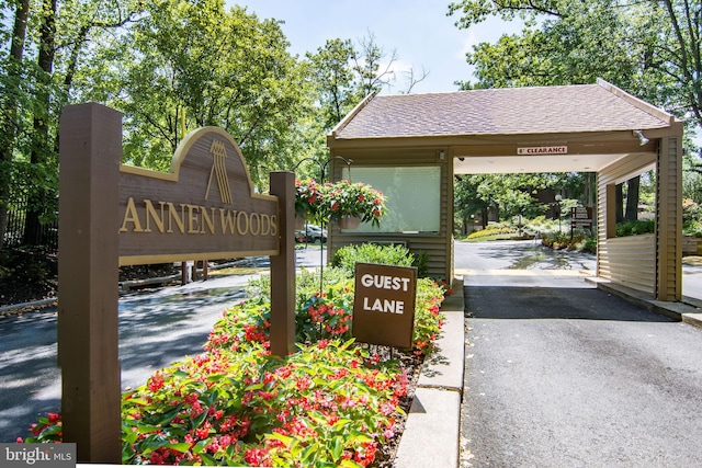 1 Gristmill Ct Unit 103, Pikesville, MD 21208 - community / neighborhood sign with asphalt driveway