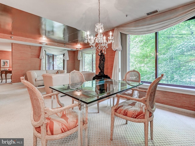 1 Gristmill Ct Unit 103, Pikesville, MD 21208 - dining room with carpet floors and a chandelier