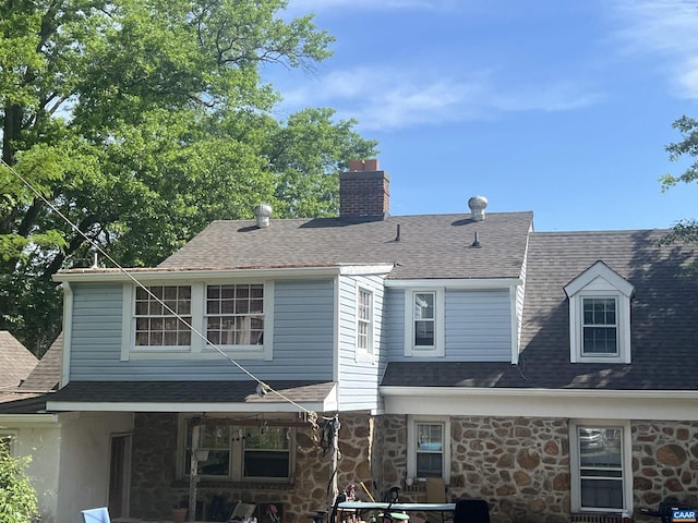 116 Washington Ave, Charlottesville, VA 22903 - view of front facade featuring a chimney, a shingled roof, and stone siding