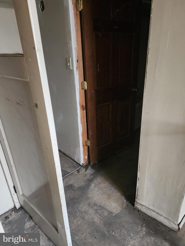 interior space featuring concrete flooring
