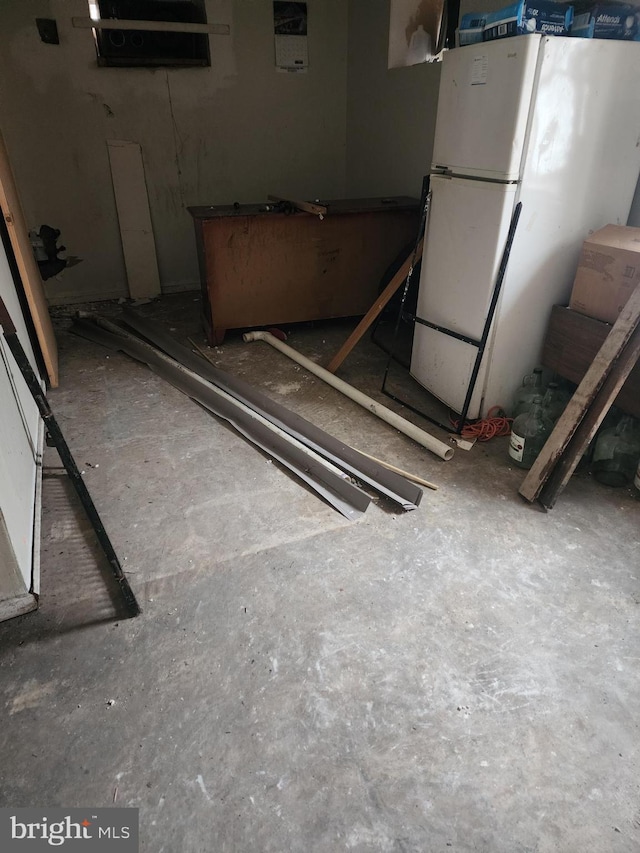 interior space featuring freestanding refrigerator