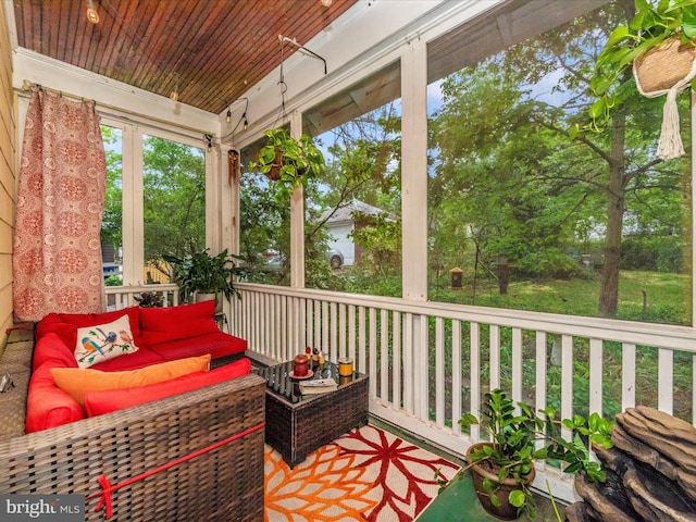 sunroom / solarium with outdoor lounge area