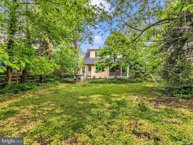 view of yard featuring fence