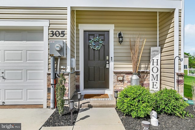 305 Maple Run Dr, York, PA 17404 - entrance to property featuring a garage and stone siding
