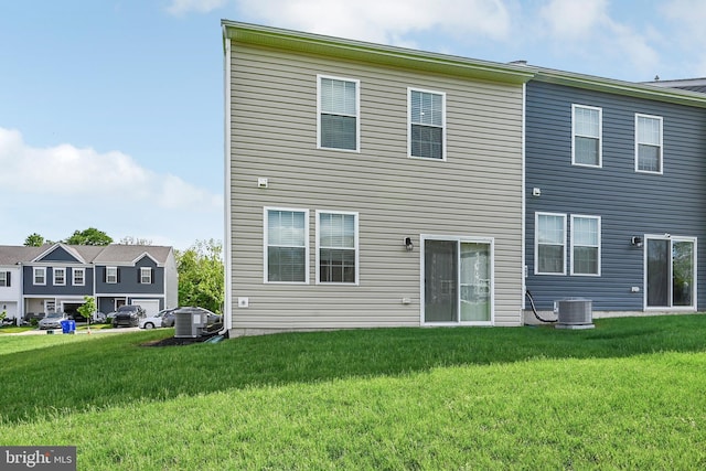 305 Maple Run Dr, York, PA 17404 - rear view of house featuring a yard and central air condition unit