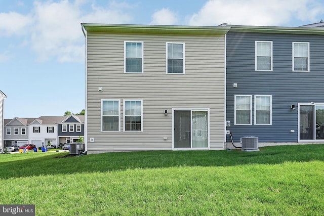 305 Maple Run Dr, York, PA 17404 - back of house with a lawn and central air condition unit