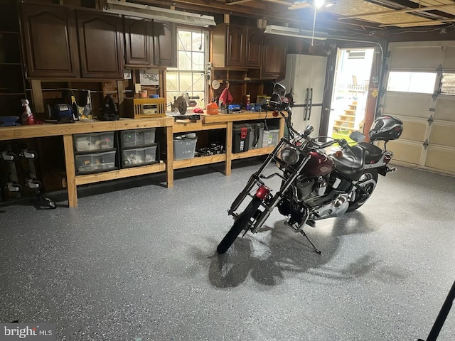garage with a workshop area
