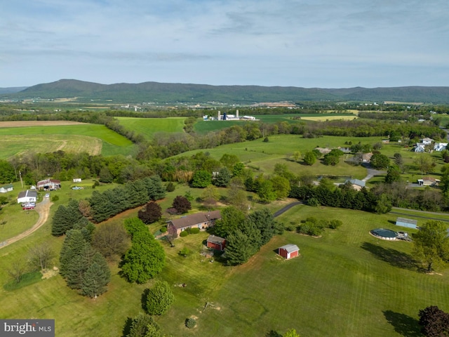 aerial view featuring a rural view and a mountain view