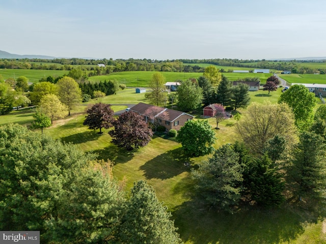 birds eye view of property featuring a rural view