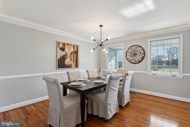2994 Hope Mill Ln, Adamstown, MD 21710 - dining area with an inviting chandelier, ornamental molding, baseboards, and wood finished floors
