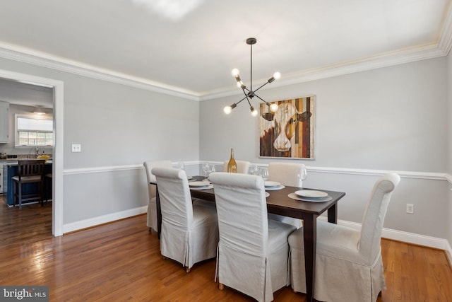 2994 Hope Mill Ln, Adamstown, MD 21710 - dining room with baseboards, a chandelier, ornamental molding, and wood finished floors