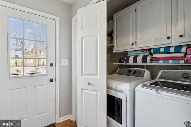 2994 Hope Mill Ln, Adamstown, MD 21710 - laundry area featuring cabinet space and independent washer and dryer