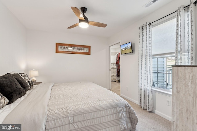 2994 Hope Mill Ln, Adamstown, MD 21710 - bedroom with carpet flooring, a walk in closet, a ceiling fan, baseboards, and visible vents