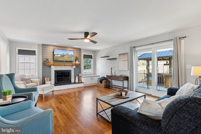 2994 Hope Mill Ln, Adamstown, MD 21710 - living area with a ceiling fan, wood finished floors, and a fireplace
