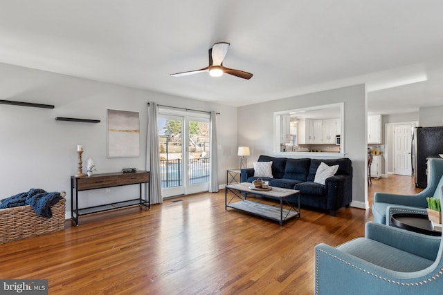 2994 Hope Mill Ln, Adamstown, MD 21710 - living room with a ceiling fan and wood finished floors