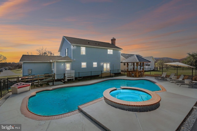 2994 Hope Mill Ln, Adamstown, MD 21710 - view of pool featuring a patio, a pool with connected hot tub, fence, and outdoor dry bar