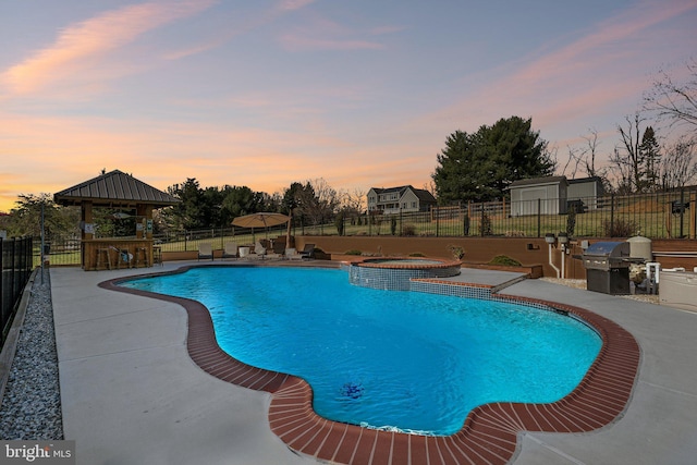 2994 Hope Mill Ln, Adamstown, MD 21710 - view of swimming pool featuring grilling area, a pool with connected hot tub, a patio area, a gazebo, and a fenced backyard