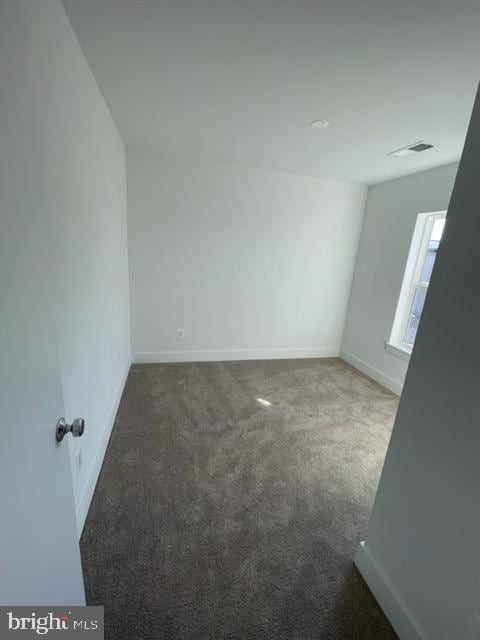 12 Mural Walk NE, Washington, DC 20011 - spare room with carpet floors, baseboards, and visible vents