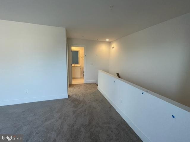 12 Mural Walk NE, Washington, DC 20011 - carpeted spare room with baseboards