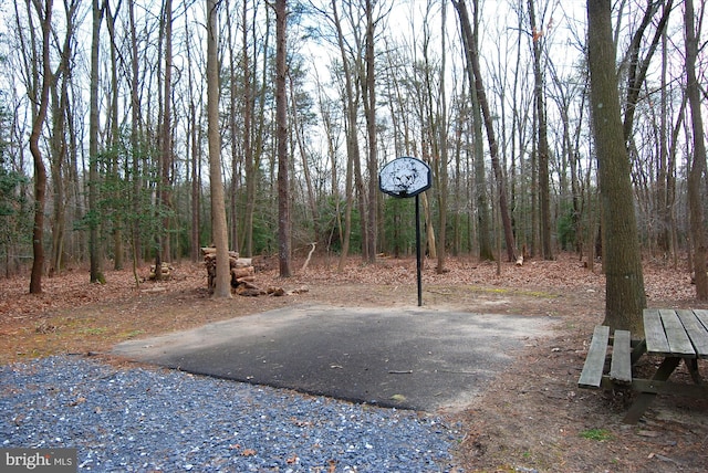 8013 Baileys Ln, Pasadena, MD 21122 - view of patio / terrace with a forest view