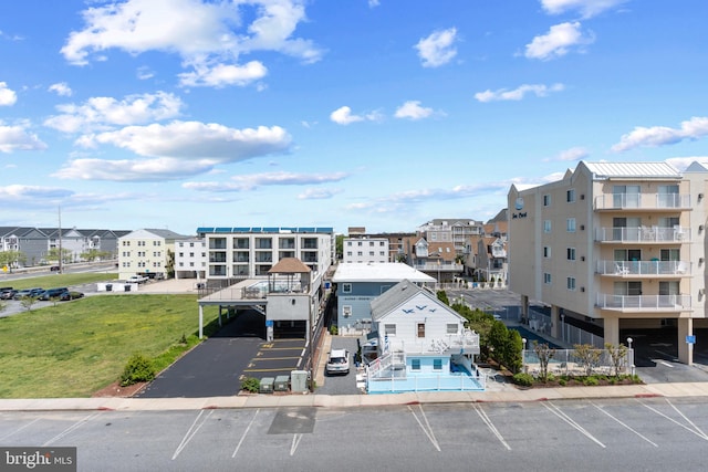 11 142nd St Unit 31003, Ocean City, MD 21842 - view of building exterior with uncovered parking