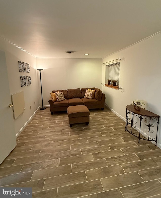 living room featuring baseboards and wood finish floors