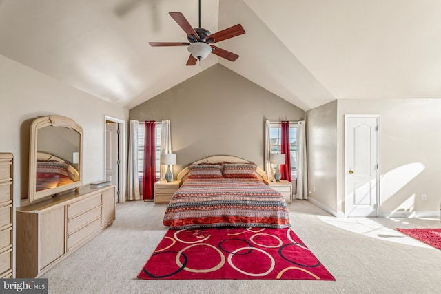 bedroom with lofted ceiling, light carpet, and ceiling fan