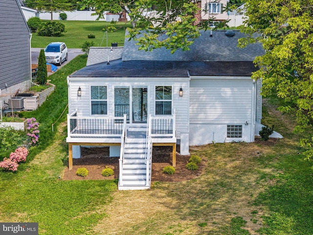 7847 Leymar Rd, Glen Burnie, MD 21060 - back of house with stairs, a yard, roof with shingles, and central AC