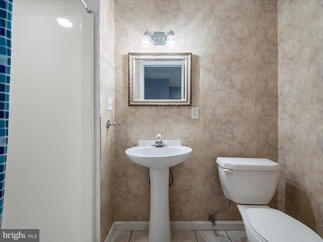 126 Boydton Plank Dr, Stephens City, VA 22655 - bathroom with toilet, baseboards, tile patterned flooring, and a sink