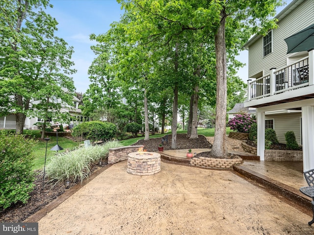 126 Boydton Plank Dr, Stephens City, VA 22655 - view of patio / terrace with an outdoor fire pit and a balcony