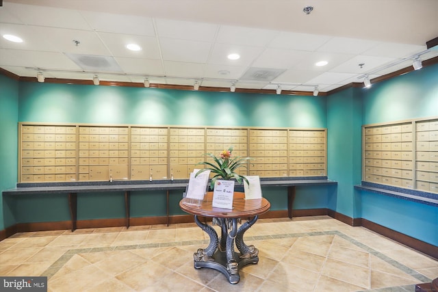 misc room with recessed lighting, tile patterned floors, baseboards, and mail area