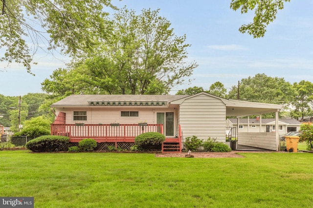 586 Rita Dr, Odenton, MD 21113 - rear view of property featuring a wooden deck and a carport