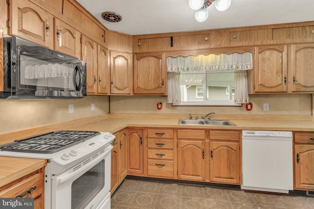 586 Rita Dr, Odenton, MD 21113 - kitchen with white appliances, a sink, and light countertops