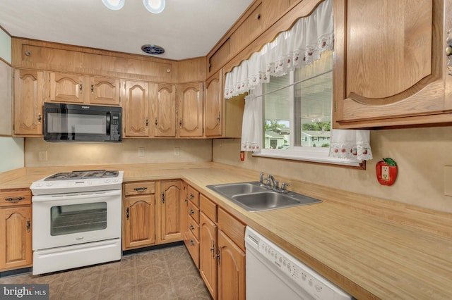 586 Rita Dr, Odenton, MD 21113 - kitchen with white appliances, a sink, and light countertops