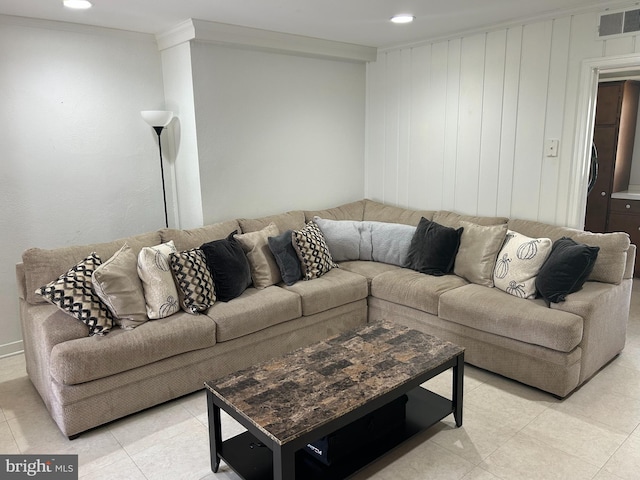 115 Carnoustie Rd, Dover, DE 19904 - living room with ornamental molding, visible vents, and recessed lighting