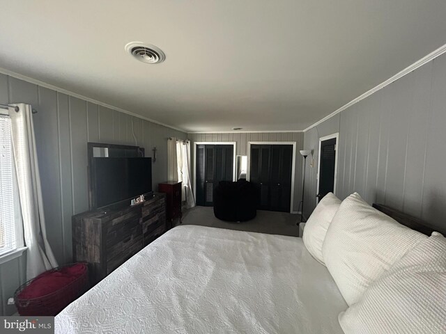 115 Carnoustie Rd, Dover, DE 19904 - bedroom with ornamental molding, visible vents, and carpet