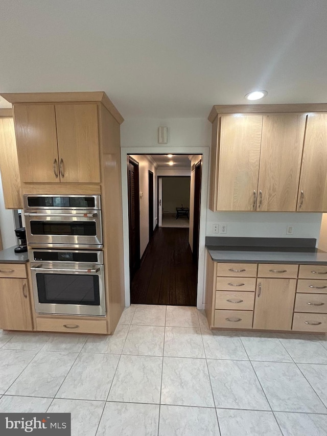 115 Carnoustie Rd, Dover, DE 19904 - kitchen featuring recessed lighting, dark countertops, stainless steel double oven, and light brown cabinetry