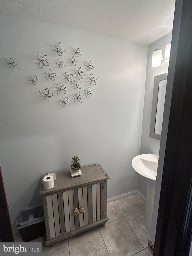 115 Carnoustie Rd, Dover, DE 19904 - bathroom featuring baseboards and tile patterned floors