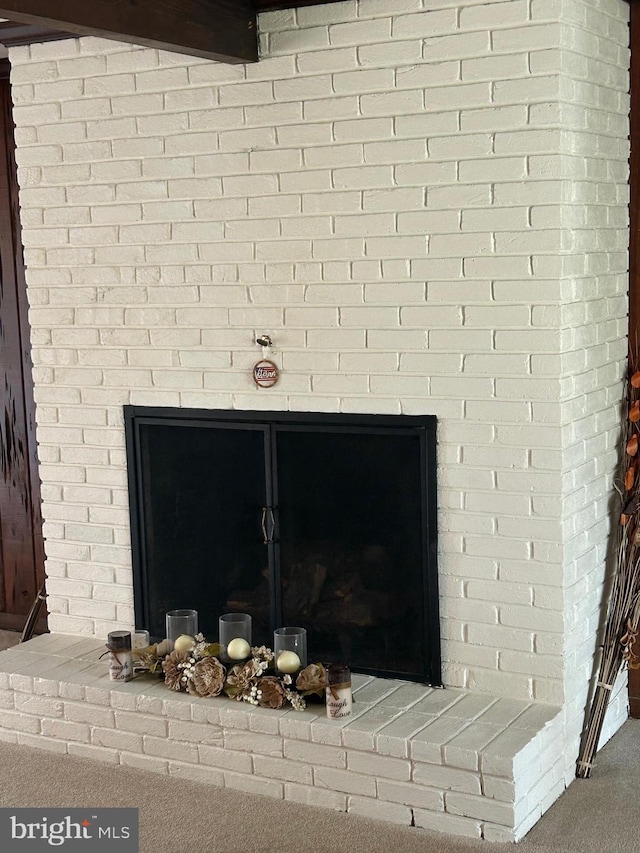 115 Carnoustie Rd, Dover, DE 19904 - interior details with carpet and a brick fireplace