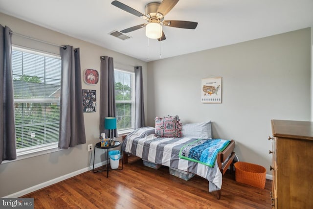 8645 Adrienne Pl, Manassas, VA 20110 - bedroom with wood finished floors, baseboards, and a ceiling fan