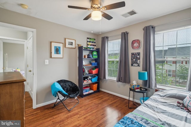 8645 Adrienne Pl, Manassas, VA 20110 - bedroom featuring wood finished floors, baseboards, and a ceiling fan