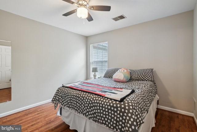 8645 Adrienne Pl, Manassas, VA 20110 - bedroom featuring baseboards, wood finished floors, and a ceiling fan