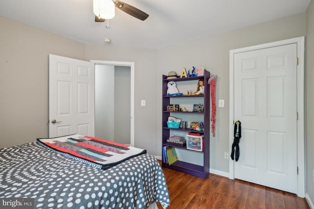 8645 Adrienne Pl, Manassas, VA 20110 - bedroom with wood finished floors and a ceiling fan