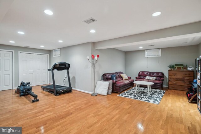 8645 Adrienne Pl, Manassas, VA 20110 - exercise room featuring wood finished floors, recessed lighting, and baseboards