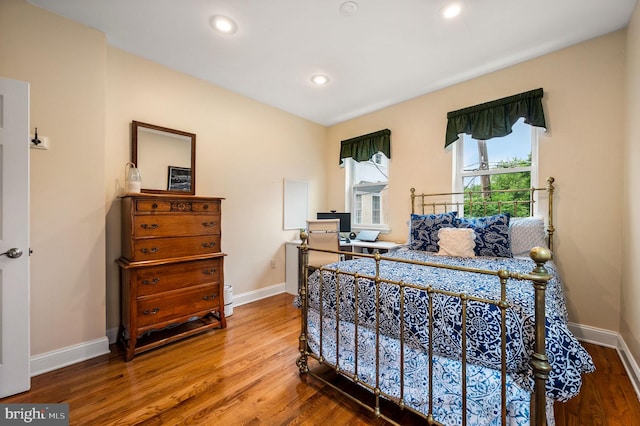 866 N 20th St, Philadelphia, PA 19130 - bedroom with wood finished floors, baseboards, and recessed lighting