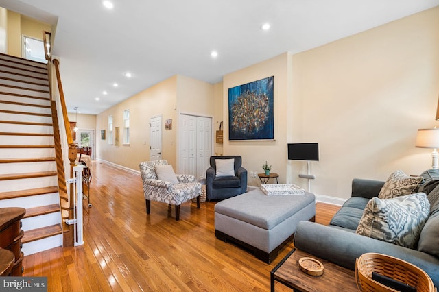 866 N 20th St, Philadelphia, PA 19130 - living room featuring baseboards, stairs, light wood-type flooring, and recessed lighting