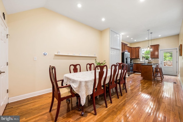 866 N 20th St, Philadelphia, PA 19130 - dining room featuring light wood-type flooring, baseboards, recessed lighting, and lofted ceiling