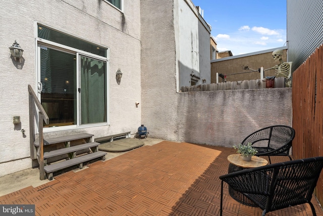 view of patio with entry steps